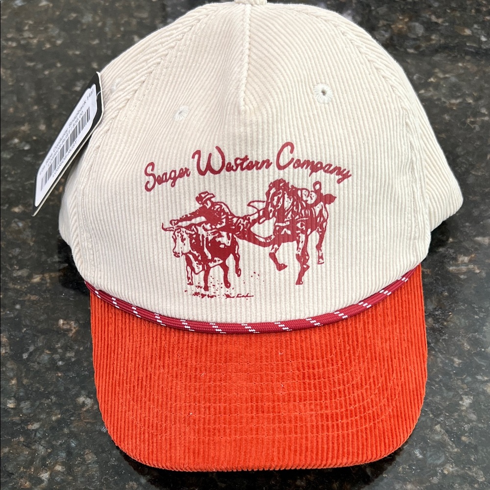 Seager Western Company rust/cream corduroy hat.